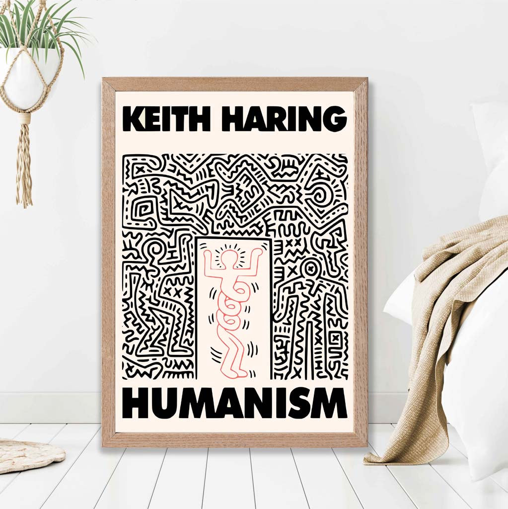 Keith Haring Humanism in Pink print in Light Oak Frame
