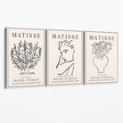 Matisse Minimal Line Art Lifestyle Set of 3 Black and Cream Canvas Prints with White Float Frame