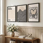 Luxury Hallway Featuring a Set of 3 Beige Bauhaus, Yayoi Kusama and Keith Haring Modern Framed Wall Art with Black Wooden Frames