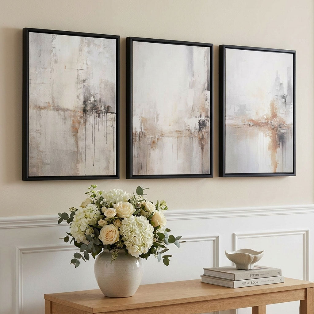 Quiet Luxury Interior showcasing a Set of 3 Minimal Abstract Neutral Greige Framed Wall Art with Black Wooden Frames