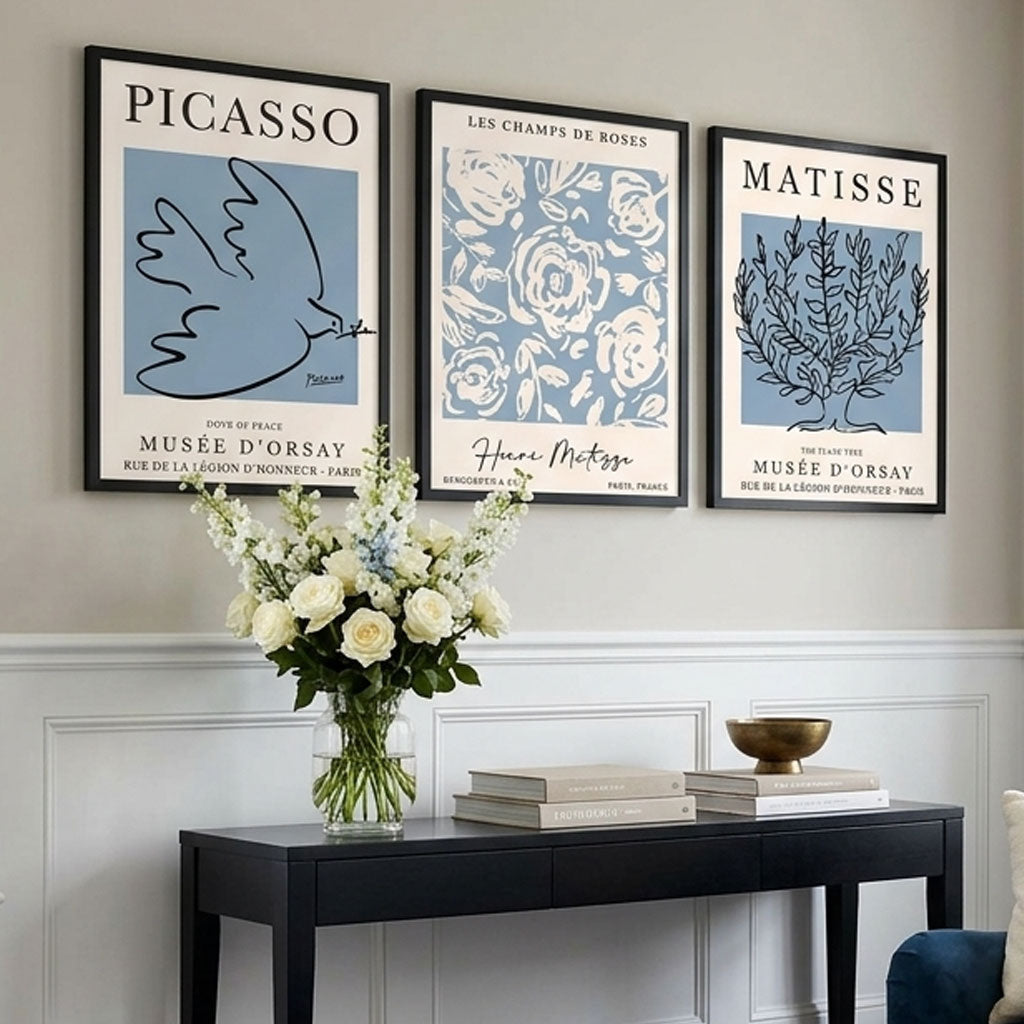 Set of 3 Minimal Picasso,Matisse Light Blue Nature Themed Framed Wall Art with Black Wooden Frames in a stylish hallway