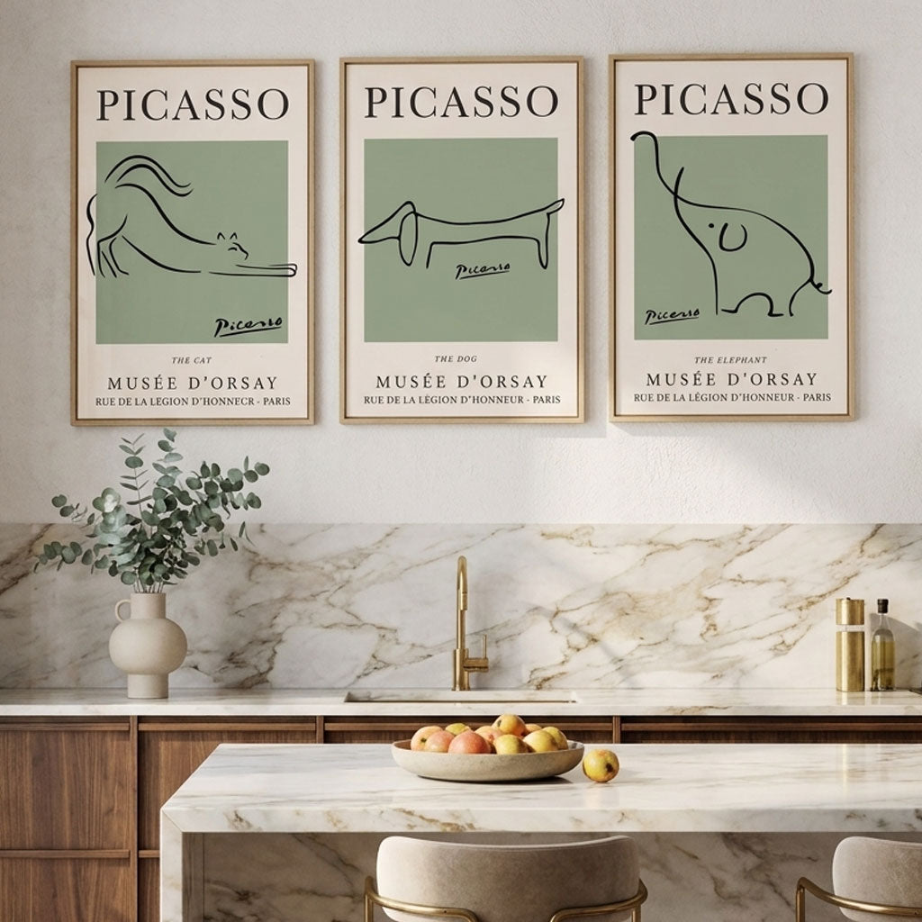 set of 3 picasso animal prints in sage green with oak frames in a stylish modern kitchen