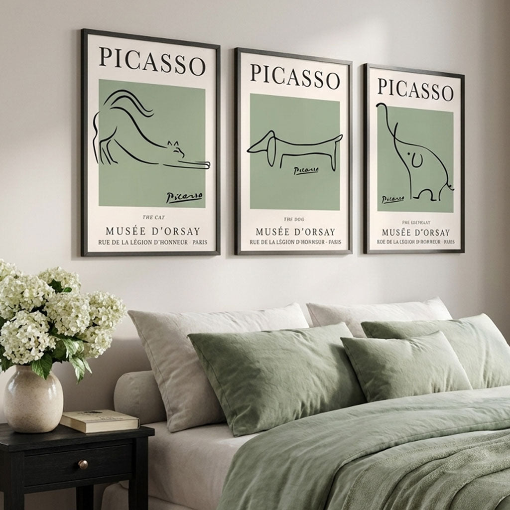 set of 3 picasso line prints in sage green with black frames in a luxury neutral bedroom