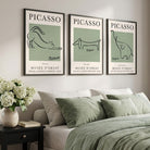 set of 3 picasso line prints in sage green with black frames in a luxury neutral bedroom