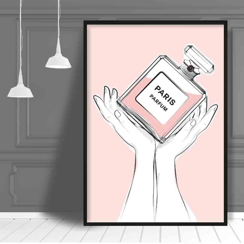 Hands holding Pink Paris Perfume Bottle Poster